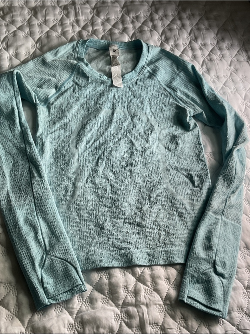 lululemon athletica light aqua textured long sleeve top with thumbholes